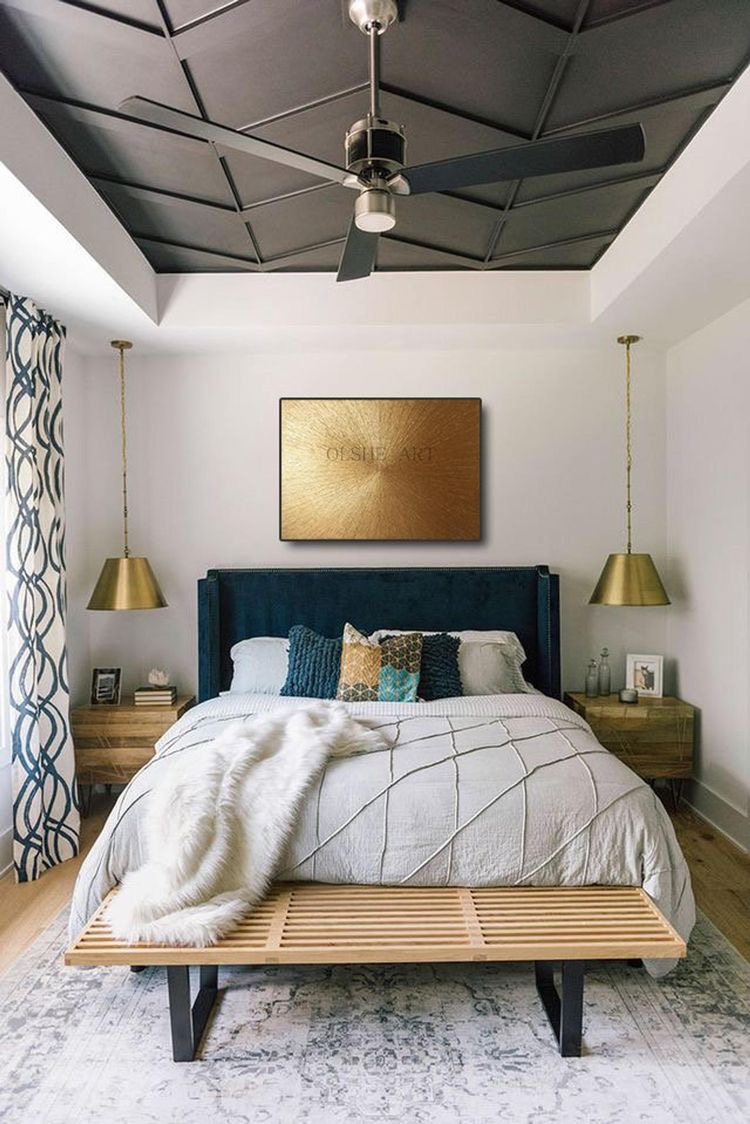 Bedroom with dark painted accent ceiling and white walls — an accent wall idea using the ceiling as the focal surface.