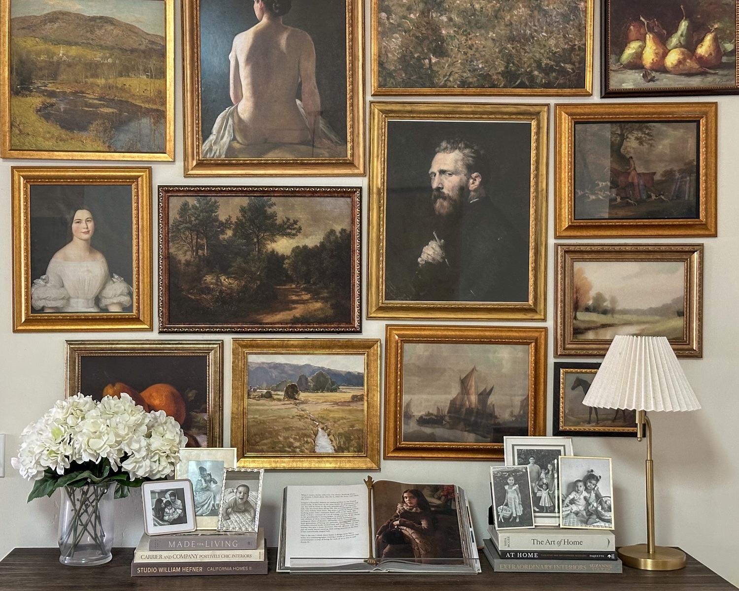 traditional gallery wall with gold ornate frames