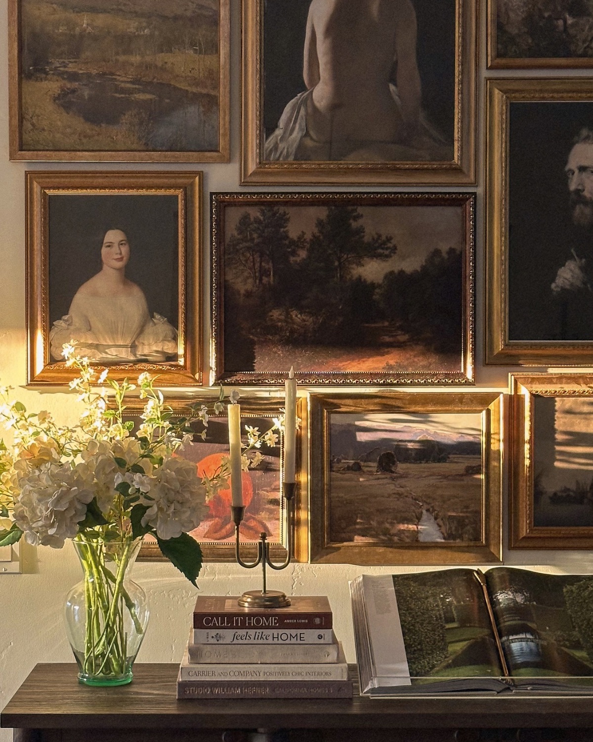 sunlit gallery wall with tabletop decor